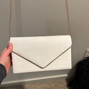 Elegant White Clutch with Gold Chain